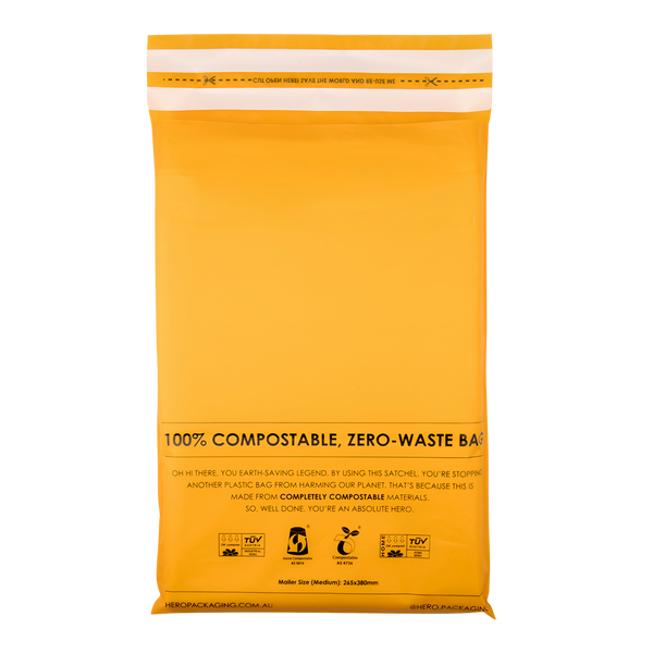 Beautiful bright yellow HEROPACK compostable mailer with double adhesive strip for reusability feature on back side