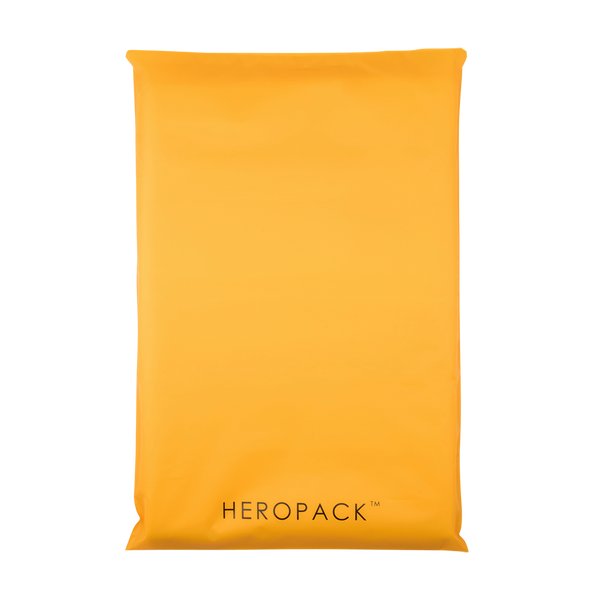 Yellow HEROPACK compostable mailer front side with HEROPACK logo